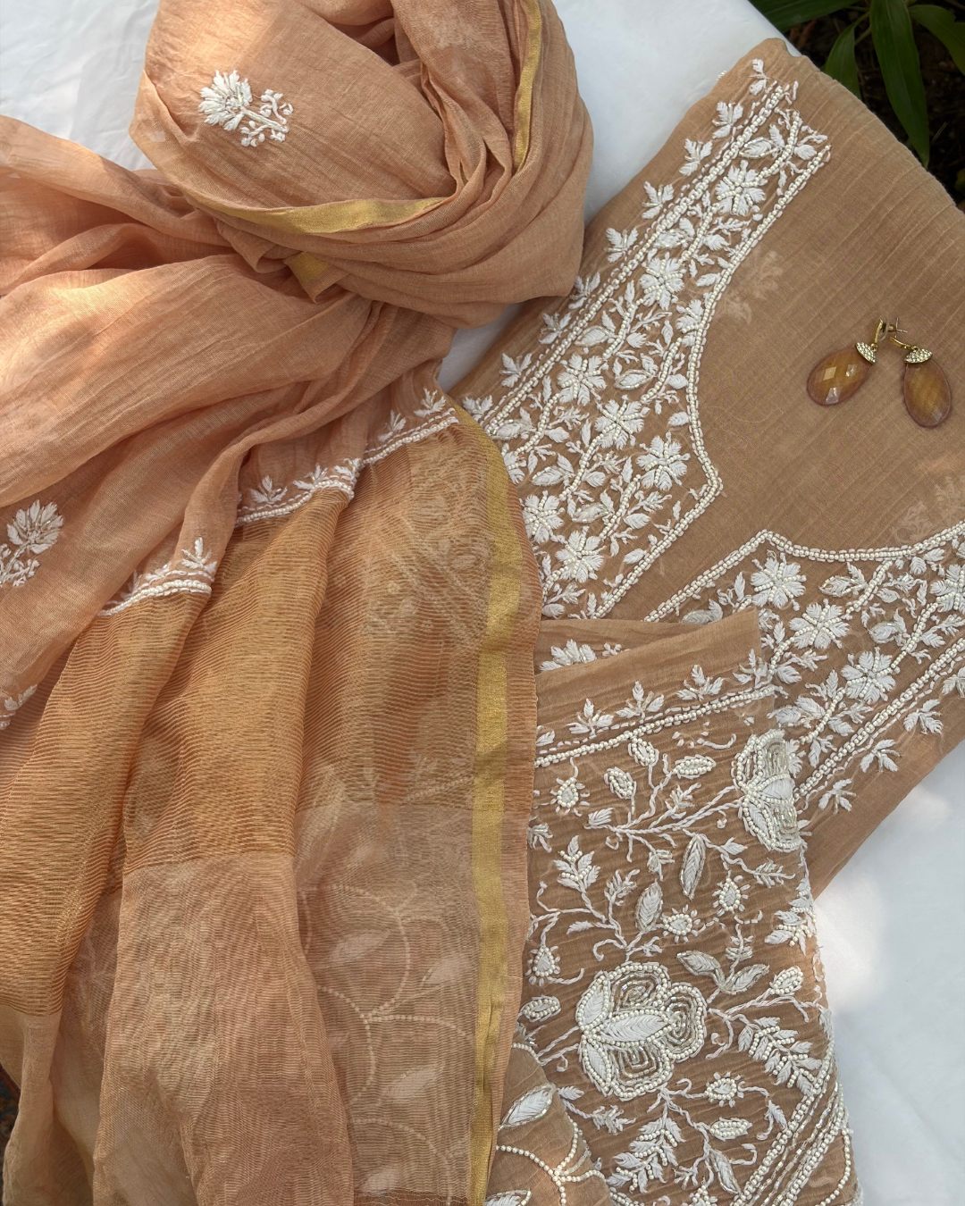 Fine Lucknowi chikankari art of awadh crafted on a rose blush mul chanderi fabric base.