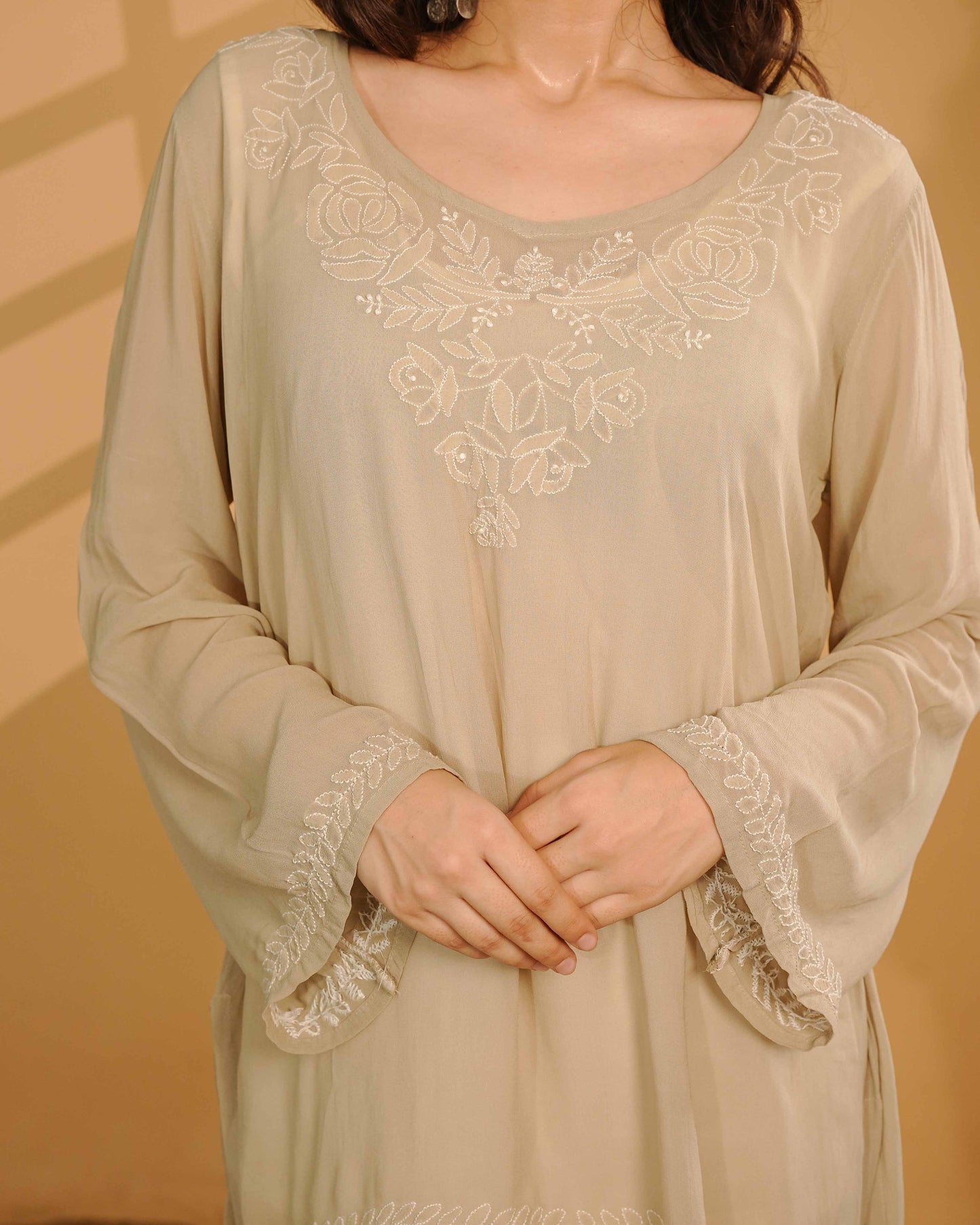 A classic viscose georgette kurti featuring timeless Lucknowi chikankari embroidery.
A testament to the enduring beauty and skilled craftsmanship found in the Art of Awadh.