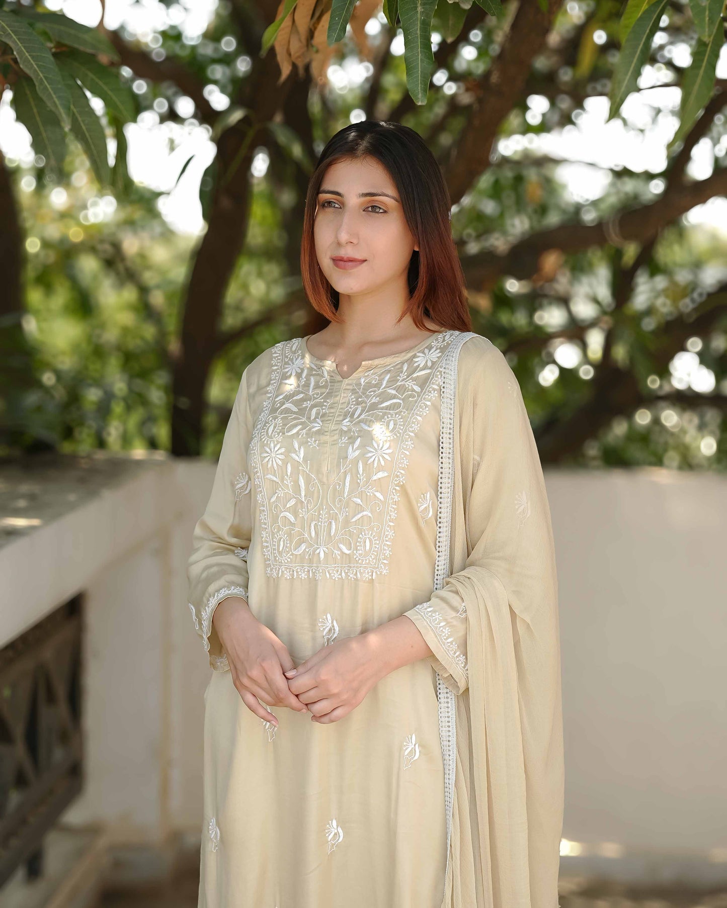 A classic pure modal satin set featuring timeless Lucknowi chikankari embroidery.
A testament to the enduring beauty and skilled craftsmanship found in every Art of Awadh festive ensemble.