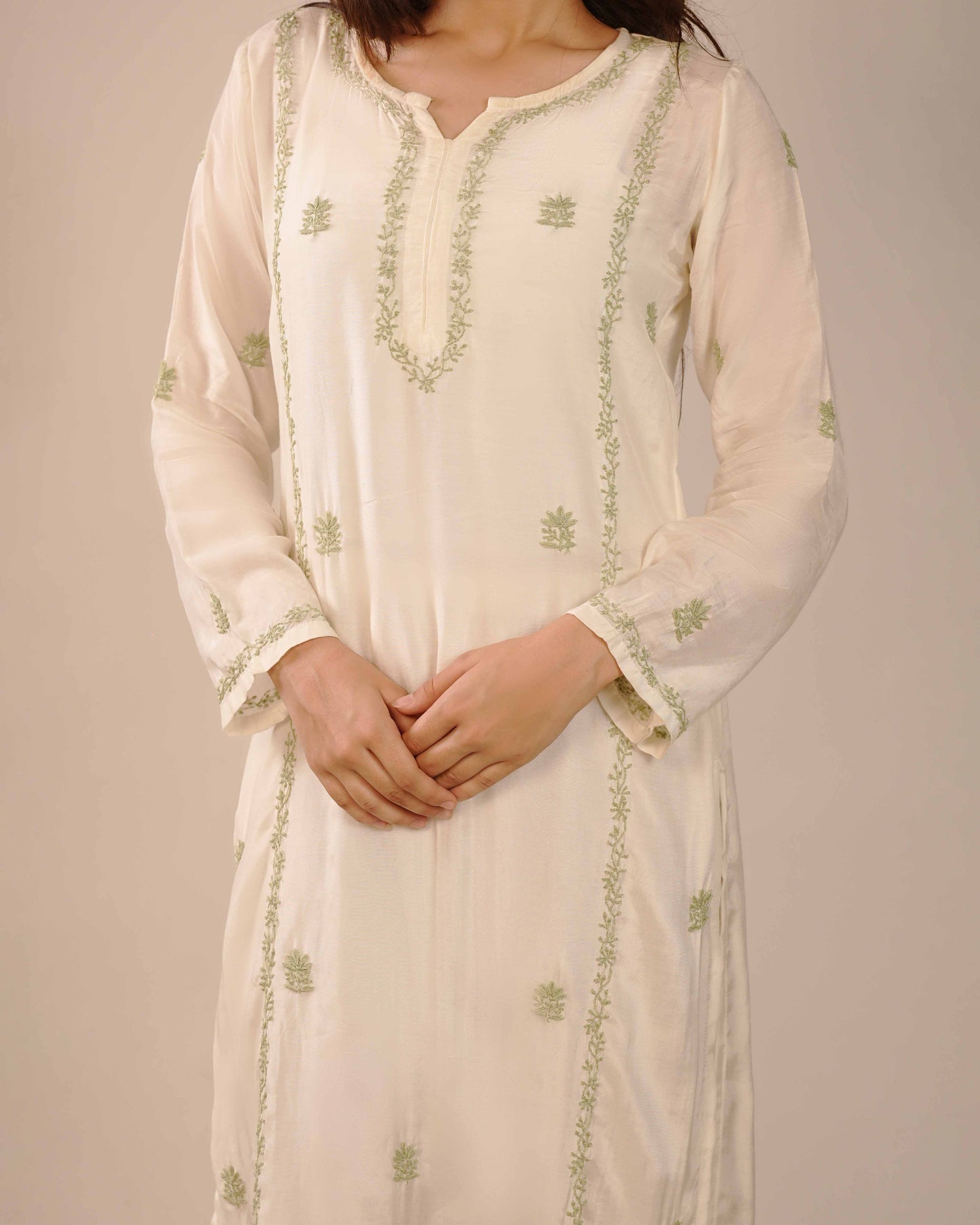 Refreshing ivory co-ord set featuring intricate Lucknowi chikankari designs.
Perfectly captures the essence of modern elegance and tradition from the Art of Awadh.
