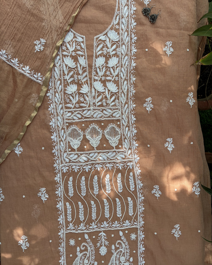 Intricate Lucknowi chikankari art of awadh displayed on a Bronze colour mul chanderi garment.
