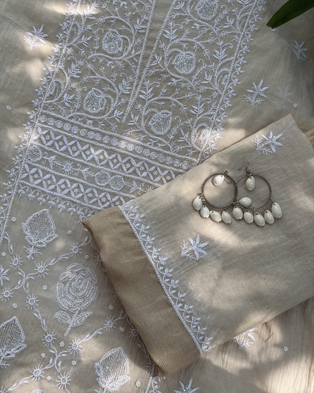 Classic Lucknowi chikankari art of awadh in beige mul chanderi for cultural gatherings.