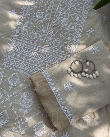 Classic Lucknowi chikankari art of awadh in beige mul chanderi for cultural gatherings.
