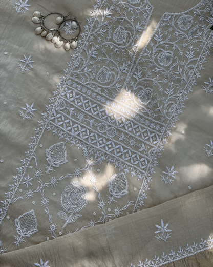 Fine Lucknowi chikankari art of awadh crafted on a beige mul chanderi fabric base.