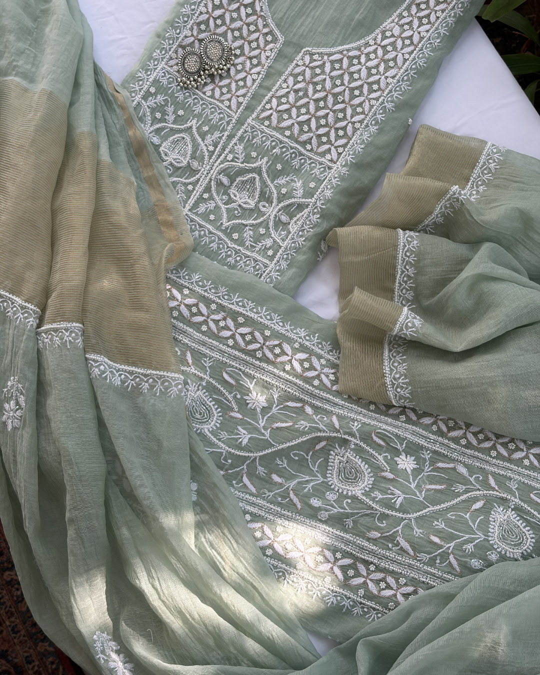 Fine Lucknowi chikankari art of awadh crafted on a pastel green mul chanderi fabric base.