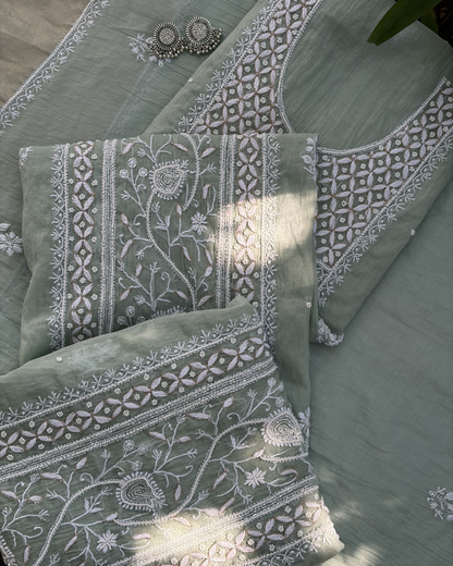 Traditional Lucknowi chikankari art of awadh on pastel green mul chanderi fabric for daytime events.