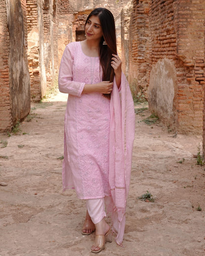 Pink mul chanderi ensemble showcasing Lucknowi chikankari art of awadh for evening events.