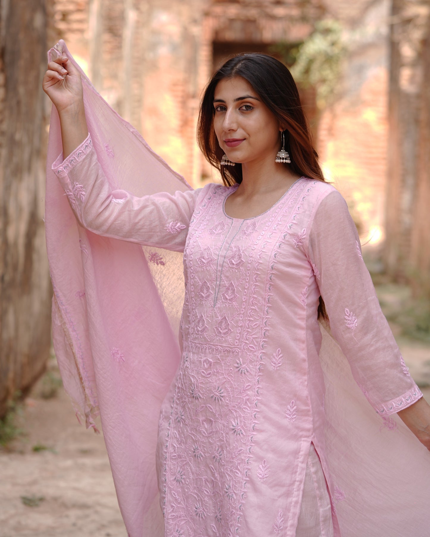 Lucknowi chikankari art of awadh in pink mul chanderi for formal evening events.