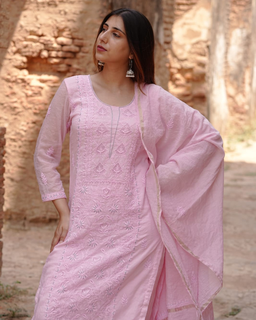Elegant pink mul chanderi garment with Lucknowi chikankari art of awadh for evening functions.
