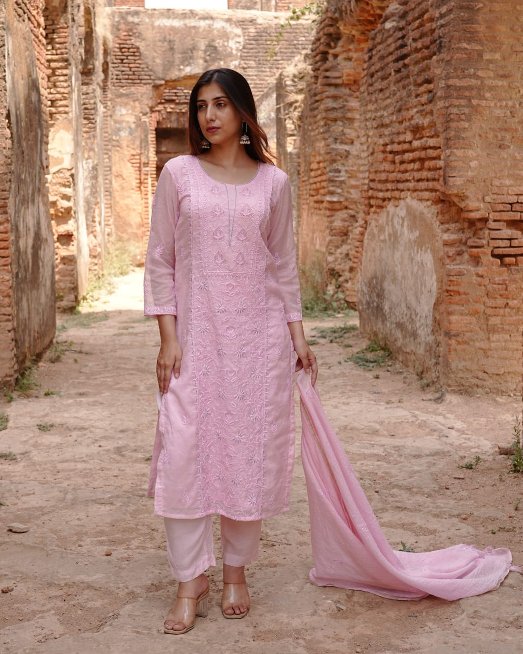 Traditional Lucknowi chikankari art of awadh in pink mul chanderi for evening gatherings.