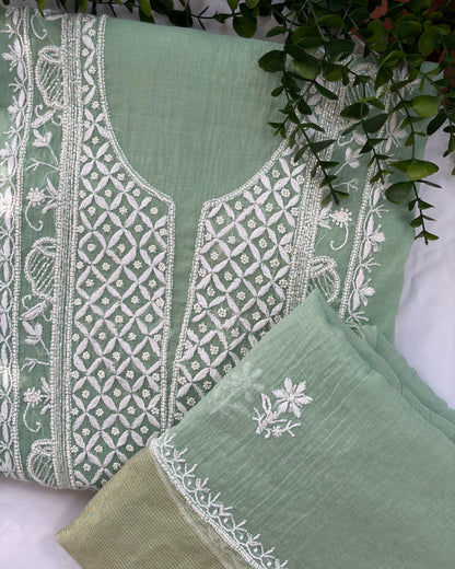 Intricate Lucknowi chikankari art of awadh displayed on a mint mul chanderi garment.