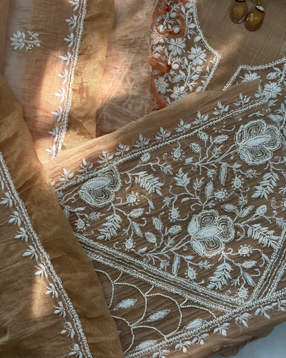 Intricate Lucknowi chikankari art of awadh displayed on a rose blush mul chanderi garment.
