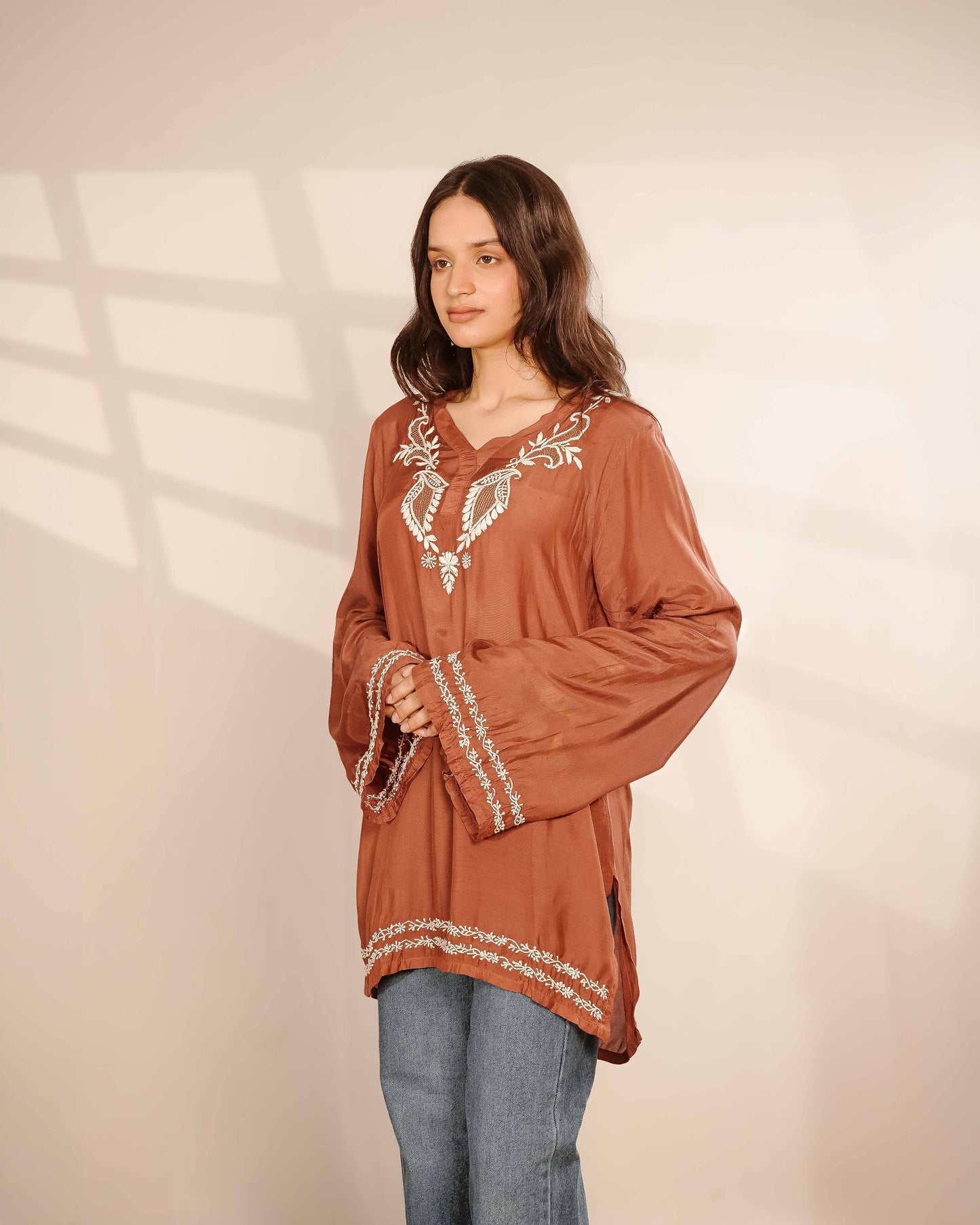 Masterfully crafted pure muslin kurta showcasing detailed Lucknowi chikankari patterns.
Celebrate the heritage of fine needlework in soft muslin, brought to you by Art of Awadh.
