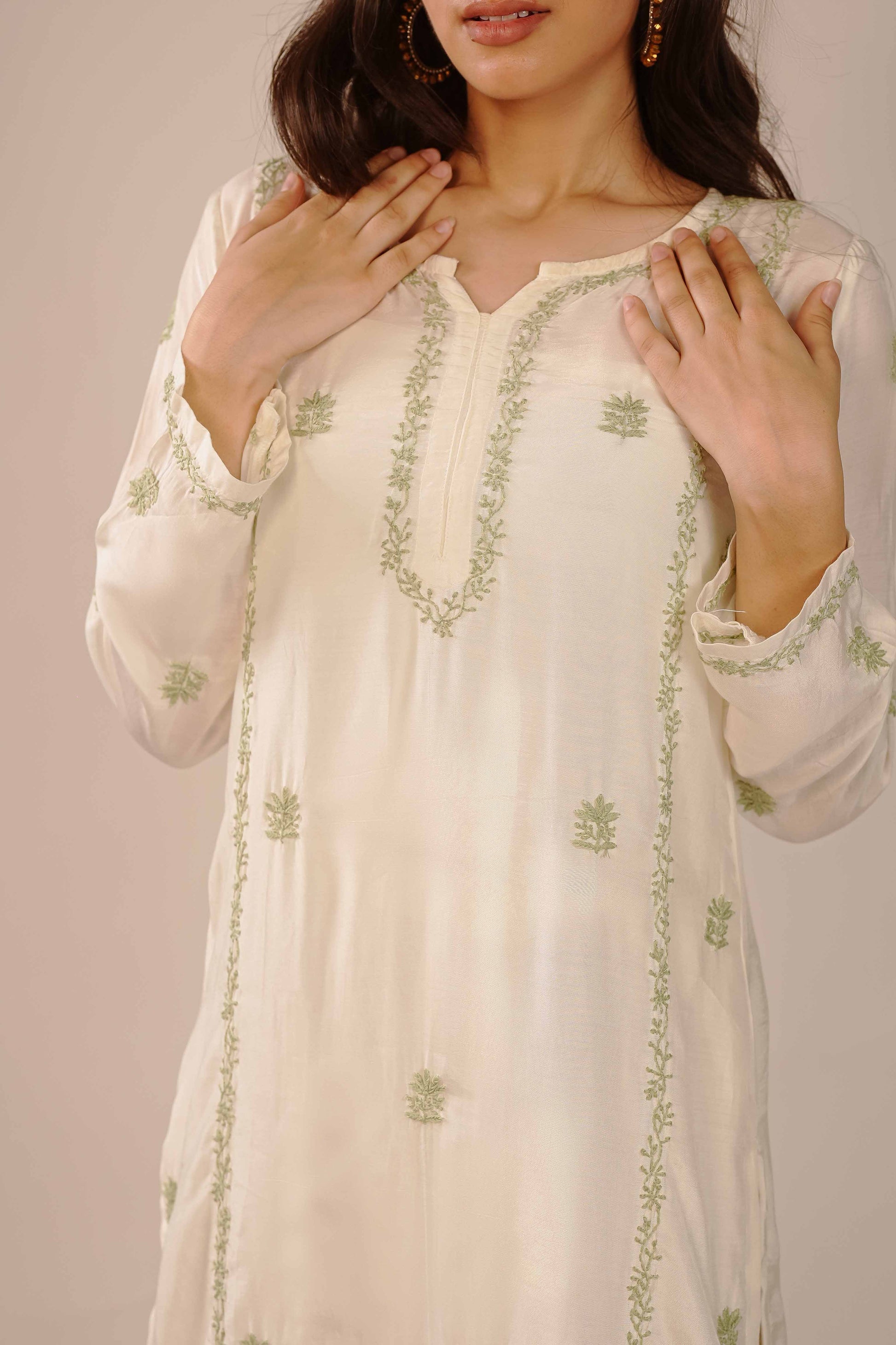 Masterfully crafted ivory co-ord set showcasing detailed Lucknowi chikankari patterns.
Celebrate the heritage of fine needlework in comfortable fabric, brought to you by Art of Awadh.
