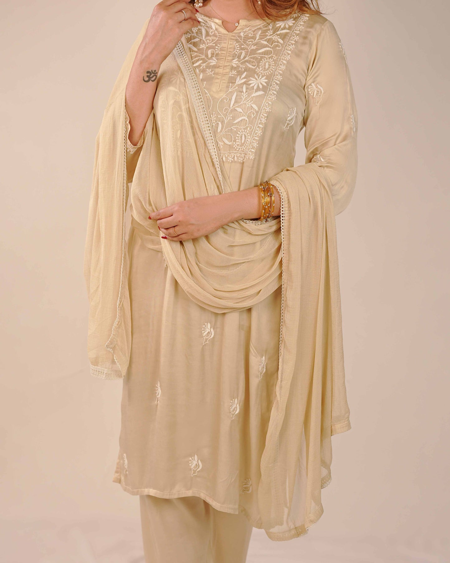 Masterfully crafted pure modal satin set showcasing detailed Lucknowi chikankari patterns.
Celebrate the heritage of fine needlework in shimmering modal satin, brought to you by Art of Awadh.
