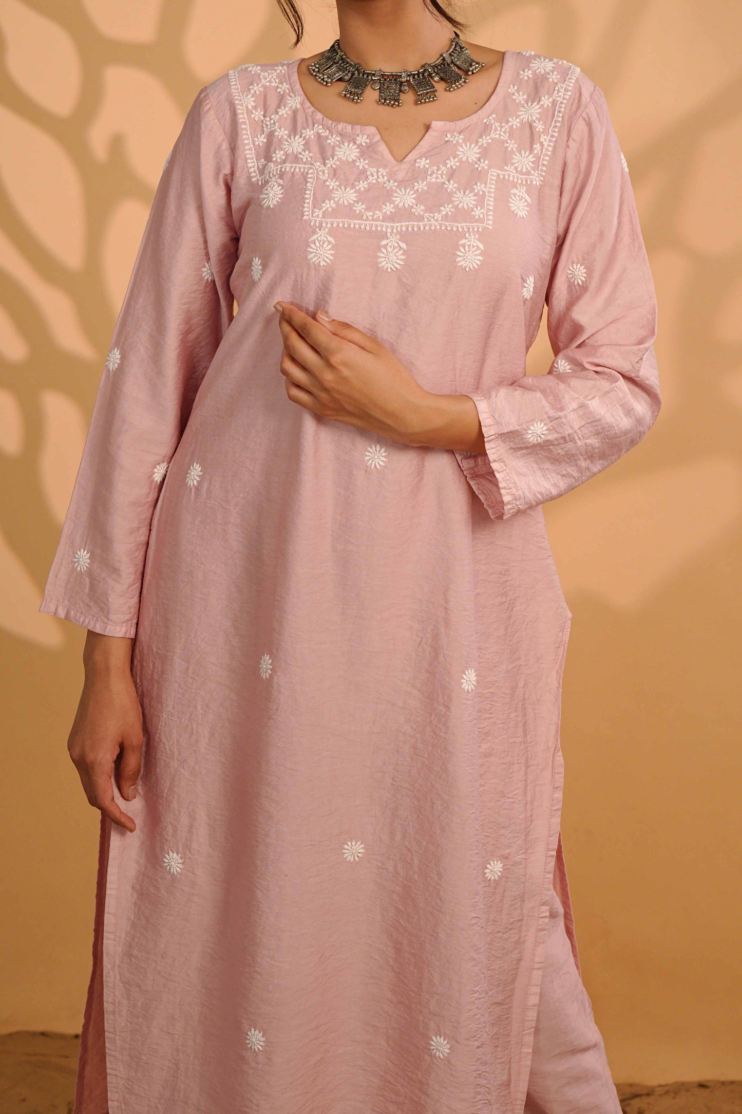 Masterfully crafted linen chanderi co-ord set showcasing detailed Lucknowi chikankari patterns.
Celebrate the heritage of fine needlework in comfortable fabric, brought to you by Art of Awadh.
