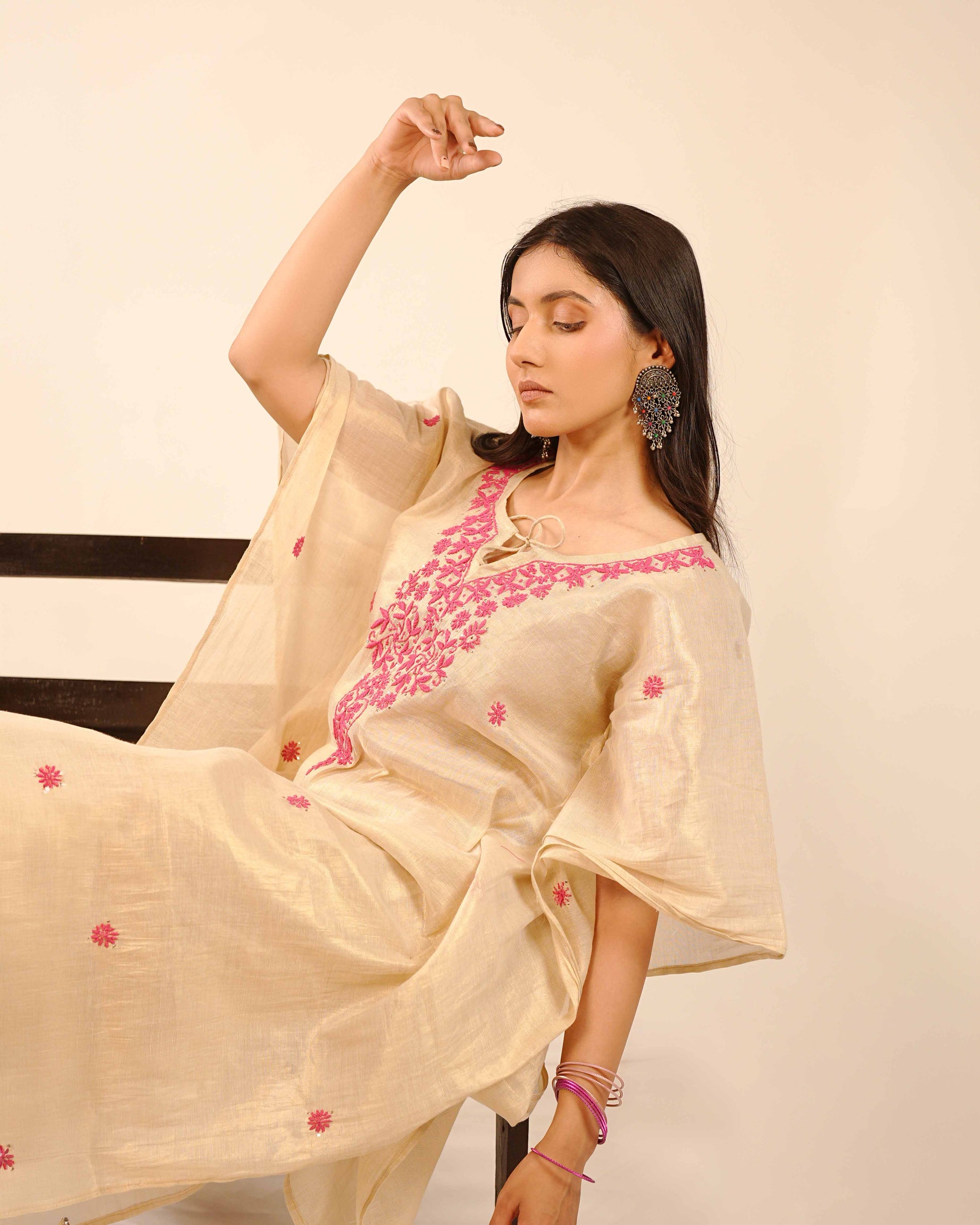 Masterfully crafted tissue co-ord set showcasing detailed Lucknowi chikankari patterns.
Celebrate the heritage of fine needlework in shimmering tissue, brought to you by Art of Awadh.
