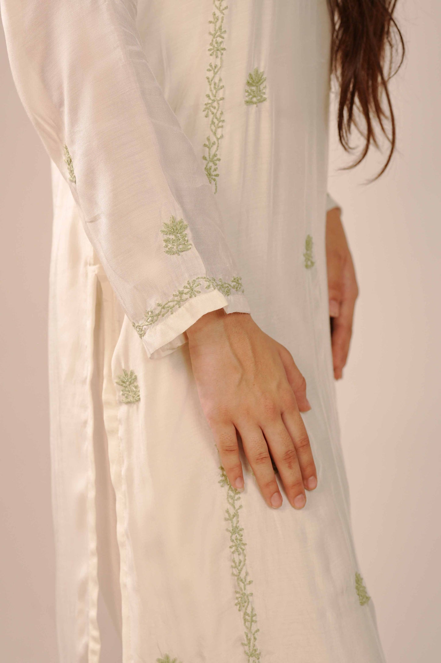 A classic ivory co-ord set featuring timeless Lucknowi chikankari embroidery.
A testament to the enduring beauty and skilled craftsmanship found in the Art of Awadh. 
