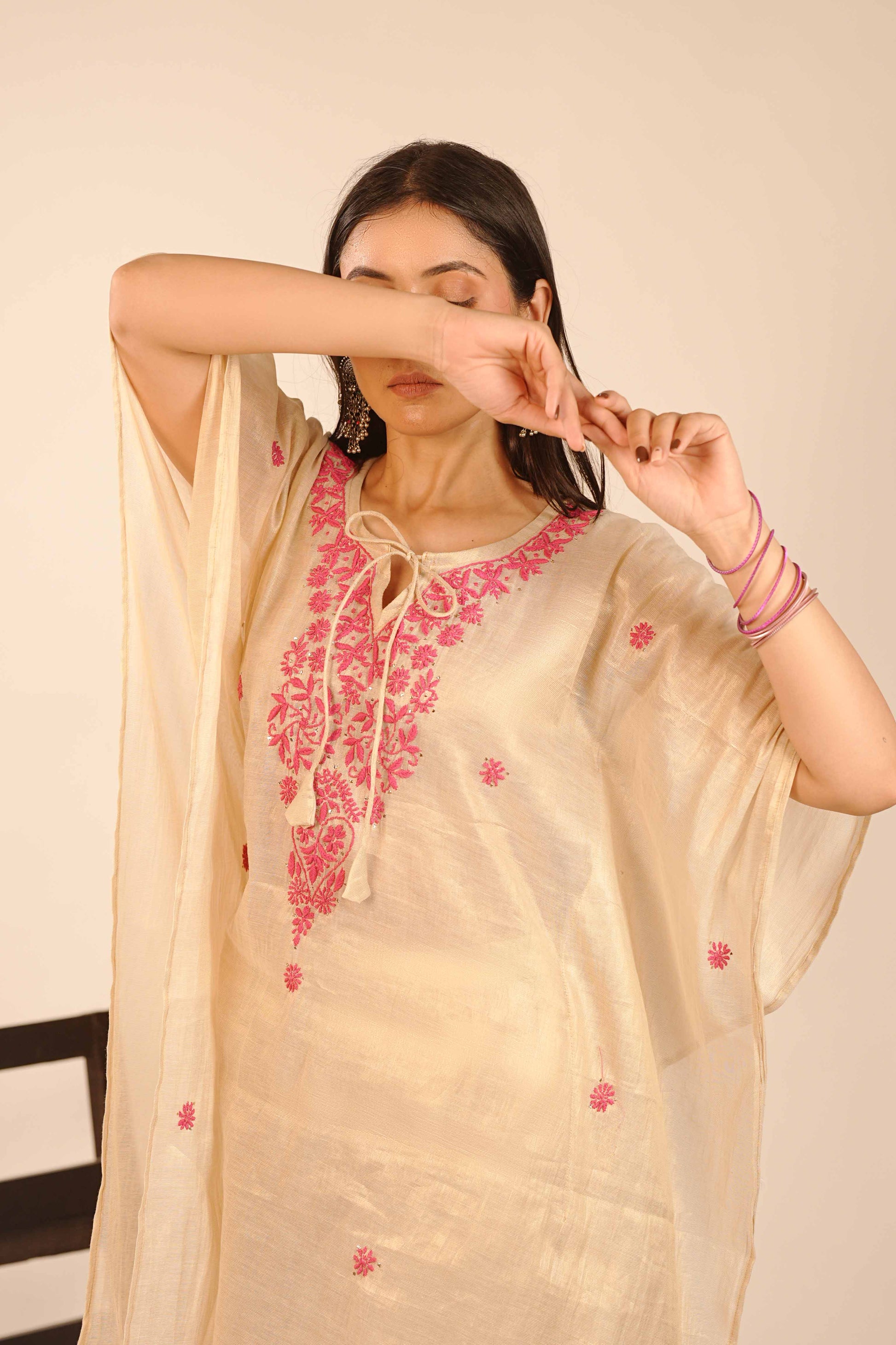 Sophisticated tissue co-ord set highlighted by detailed Lucknowi chikankari artistry.
A versatile and chic addition to your wardrobe, curated by the experts at Art of Awadh.
