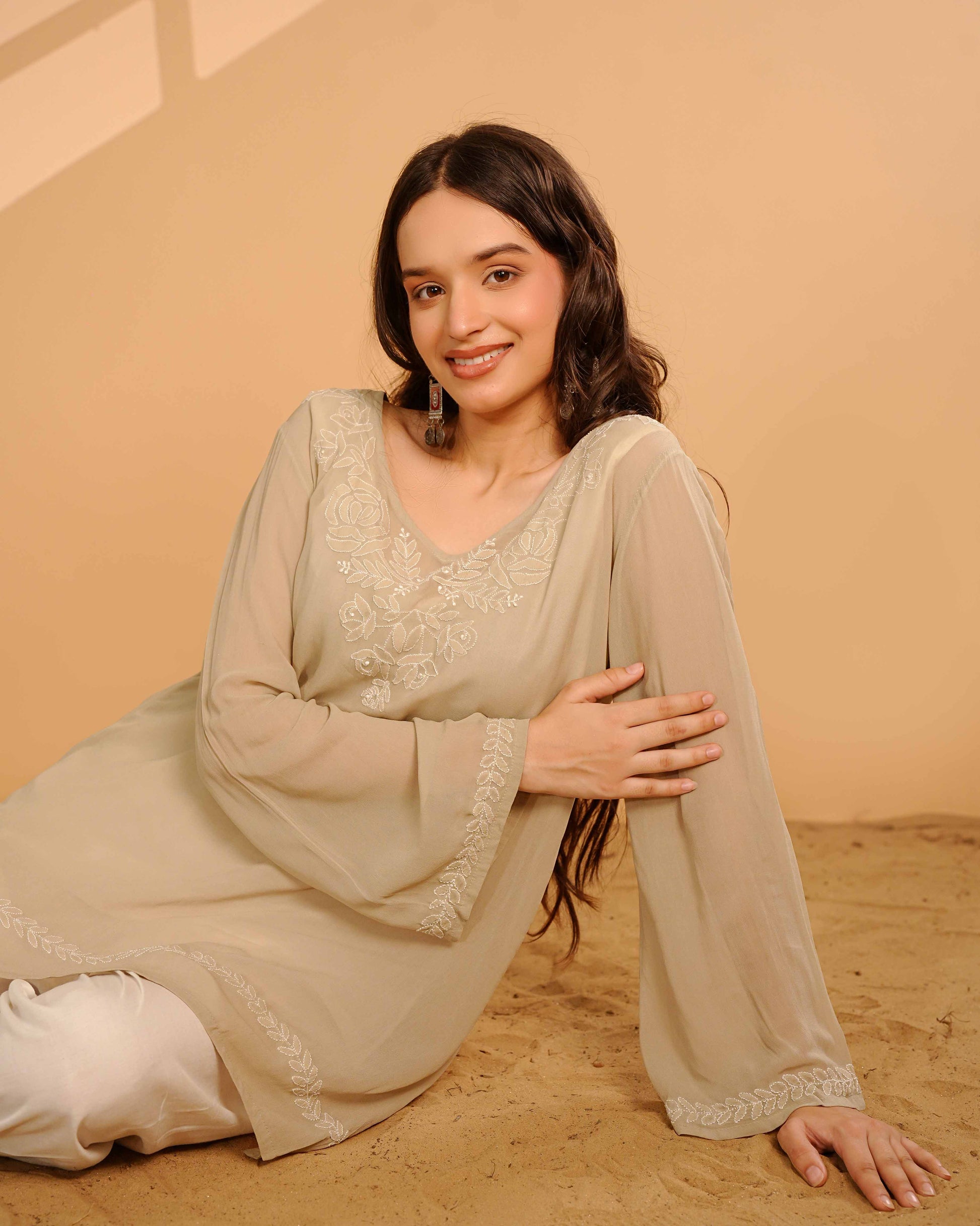 Lightweight viscose georgette kurti adorned with authentic Lucknowi chikankari artistry.
Elevate your everyday casual look with this breathable piece from the Art of Awadh.
