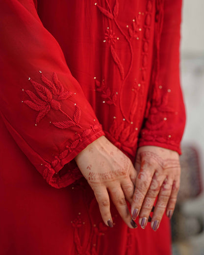 Minimalist red kurta set showcasing heritage Lucknowi chikankari techniques.
Premium ethnic wear from the Art of Awadh for effortless office and daily styling.
