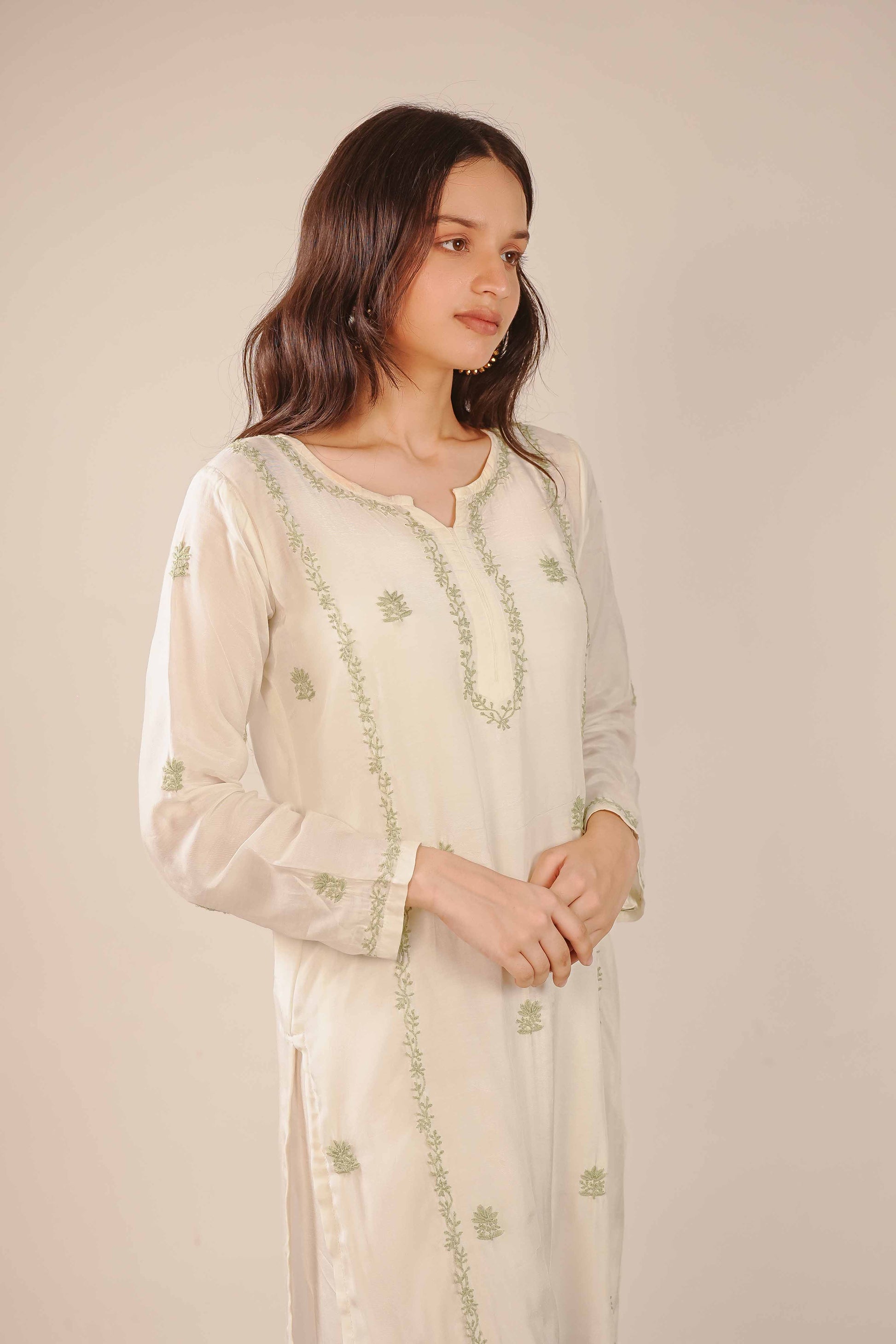 Heritage-inspired ivory co-ord set with authentic Lucknowi chikankari motifs.
A beautiful representation of historic Art of Awadh craftsmanship for daily office or college wear.
