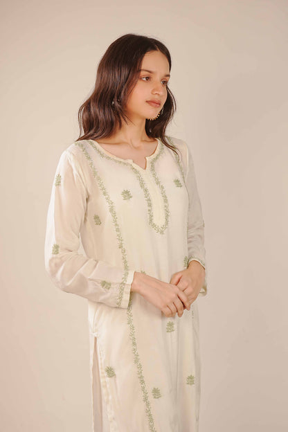 Heritage-inspired ivory co-ord set with authentic Lucknowi chikankari motifs.
A beautiful representation of historic Art of Awadh craftsmanship for daily office or college wear.
