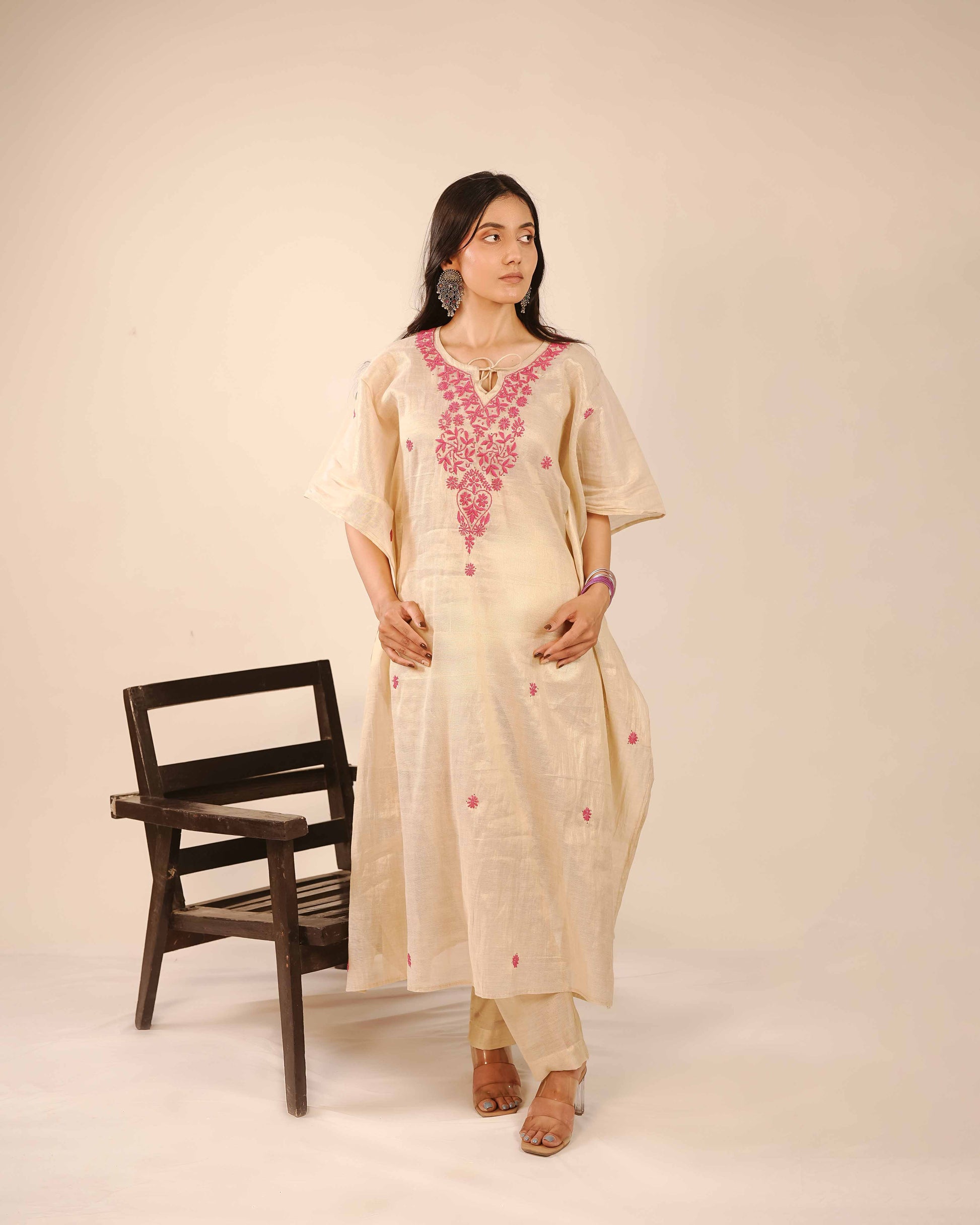 Heritage-inspired tissue co-ord set with authentic Lucknowi chikankari motifs.
A beautiful representation of historic Art of Awadh craftsmanship for any traditional day event.
