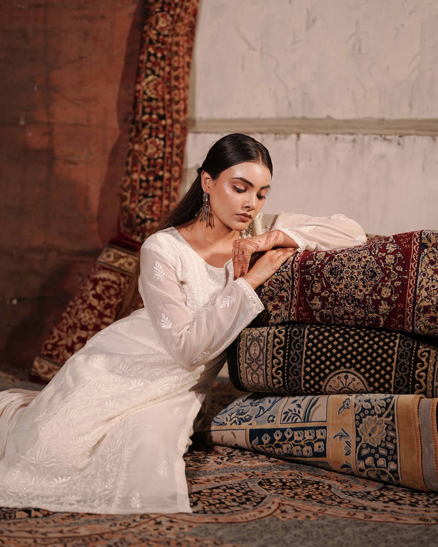 Authentic white chikankari suit in premium Mul Chanderi by Art of Awadh.
Beautifully crafted to ensure you shine at every evening party and traditional event.
